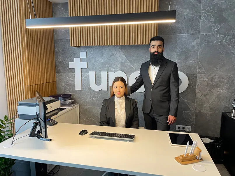 Two of the Funero team at the desk in the Covent Garden office